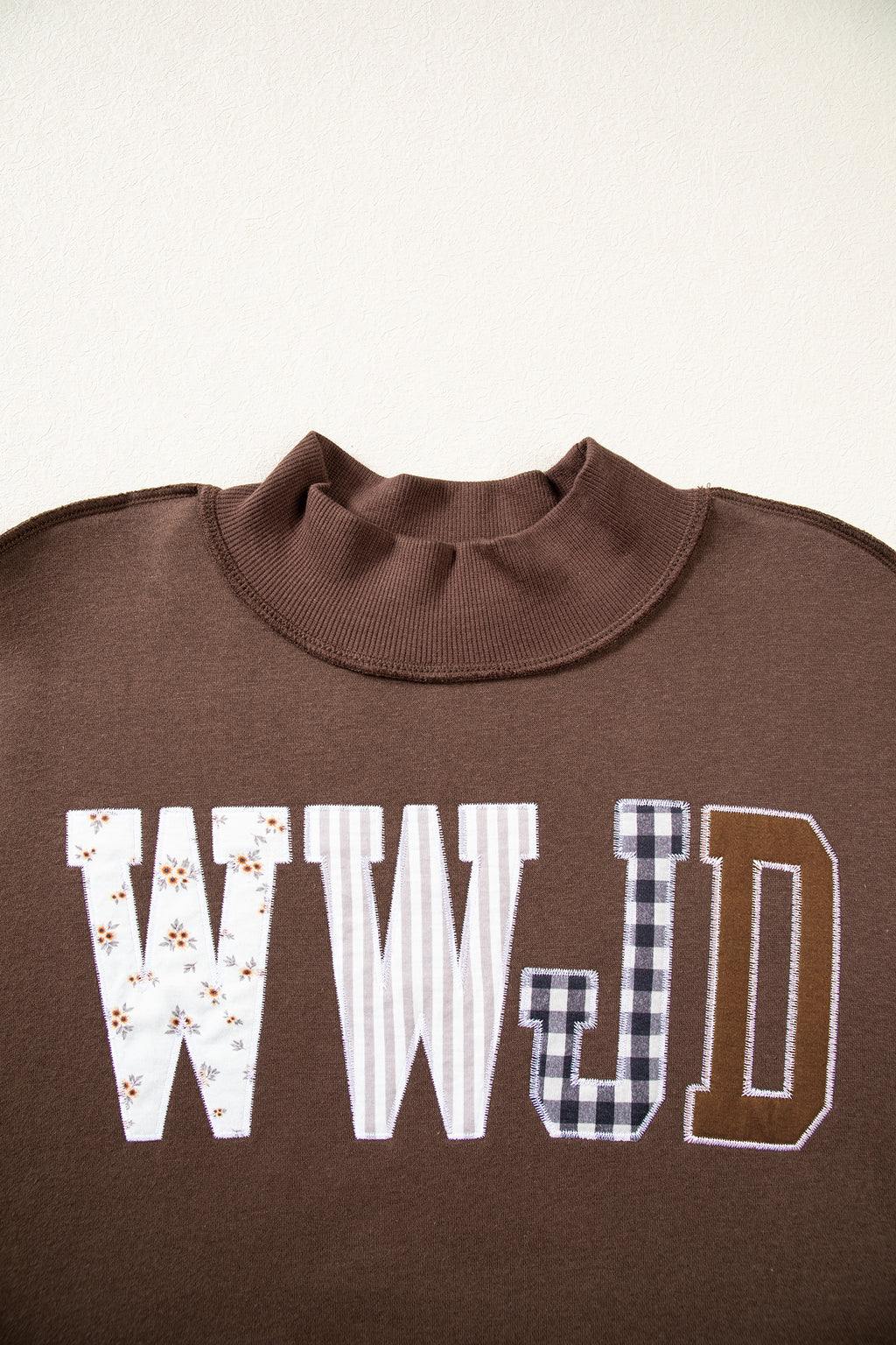 Bonbon WWJD Mixed Pattern Embroidered Patch Graphic Mock Neck Sweatshirt